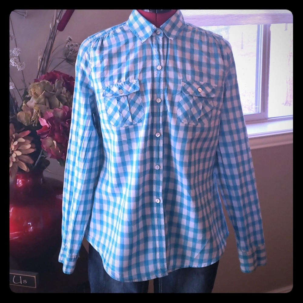 A Long-Sleeved Blue Checkered Shirt